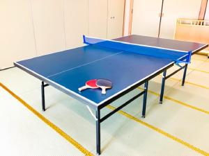 Stolní tenis v ubytování LiVEMAX RESORT Kaga Yamashiro nebo okolí