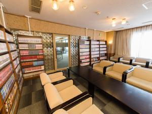 Postel nebo postele na pokoji v ubytování LiVEMAX RESORT Kaga Yamashiro
