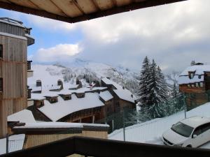 a view of a snow covered mountain from a building at Appartement Avoriaz, 2 pièces, 6 personnes - FR-1-633-39 in Morzine