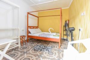 Postel nebo postele na pokoji v ubytování Enkayz Mombasa