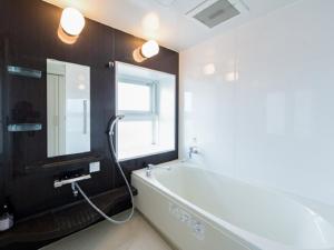 Koupelna v ubytování Spa Resort LiVEMAX