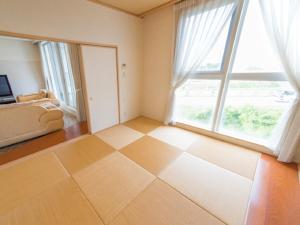 Postel nebo postele na pokoji v ubytování Spa Resort LiVEMAX