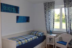 Postel nebo postele na pokoji v ubytování Ferienwohnung an der Elz