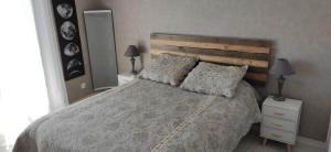 Postel nebo postele na pokoji v ubytování Appartement lumineux vue mer