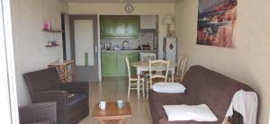 Kuchyň nebo kuchyňský kout v ubytování Appartement lumineux vue mer