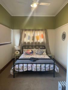 Katil atau katil-katil dalam bilik di Trippypossums House
