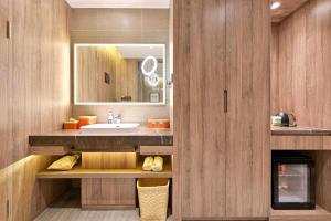 Kuchyň nebo kuchyňský kout v ubytování Atour Hotel Dalian Zhuanghe