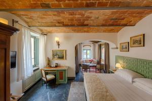 Łóżko lub łóżka w pokoju w obiekcie Hotel Mulino di Firenze - WorldHotels Crafted
