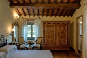 Łóżko lub łóżka w pokoju w obiekcie Hotel Mulino di Firenze - WorldHotels Crafted