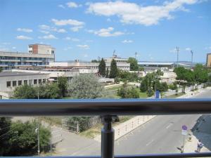 a view of a city from a balcony at Rayski zalez in Pomorie