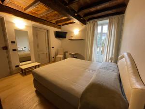Ένα ή περισσότερα κρεβάτια σε δωμάτιο στο B&B Fior Di Farine +45 φωτογραφίες