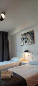 Posteľ alebo postele v izbe v ubytovaní Best View - Welcome Penthouse Apartamentos Karola + 37 fotografií
