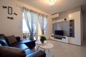 TV a/nebo společenská místnost v ubytování Apartment Lucy