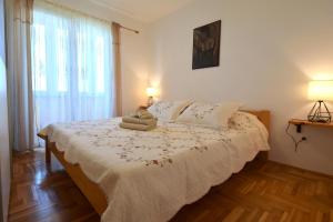 Postel nebo postele na pokoji v ubytování Apartment Lucy