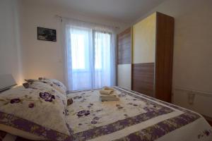 Postel nebo postele na pokoji v ubytování Apartment Lucy