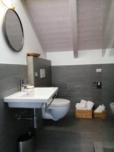 A bathroom at Bellagio Holiday Home Még 37 kép