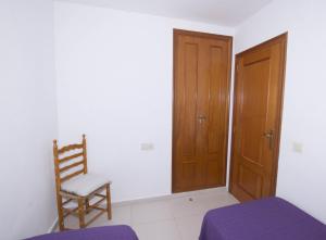 Postel nebo postele na pokoji v ubytování Edificio La Reina