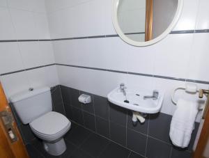 Koupelna v ubytování Edificio La Reina