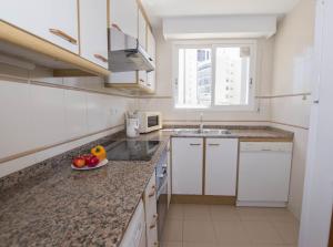 Kuchyň nebo kuchyňský kout v ubytování Edificio La Reina