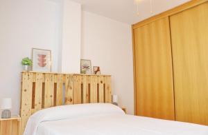 Łóżko lub łóżka w pokoju w obiekcie Apartamento Río Salado