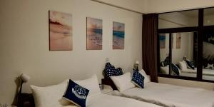 Cama o camas de una habitación en Pier 10