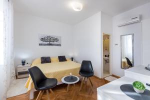 Ein Sitzbereich in der Unterkunft Guest House Anna