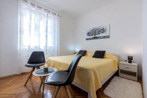 Ein Bett oder Betten in einem Zimmer der Unterkunft Guest House Anna