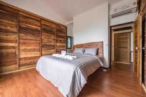 Letto o letti in una camera di Hidden Beach Resort