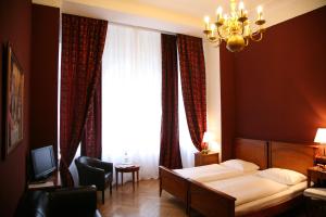 Katil atau katil-katil dalam bilik di Hotel-Maison Am Olivaer Platz