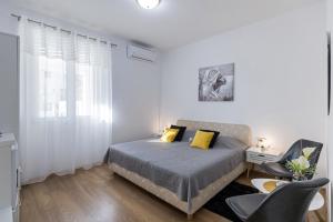 Ein Bett oder Betten in einem Zimmer der Unterkunft Guest House Anna