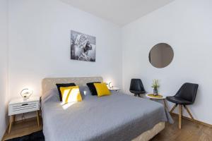 Posteľ alebo postele v izbe v ubytovaní Guest House Anna