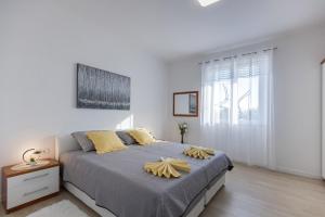 Ein Bett oder Betten in einem Zimmer der Unterkunft Guest House Anna