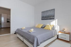 Ein Bett oder Betten in einem Zimmer der Unterkunft Guest House Anna