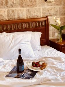 Letto o letti in una camera di Carrubba