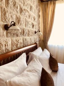 Letto o letti in una camera di Carrubba
