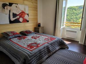 Postel nebo postele na pokoji v ubytování L,'ATELIER Impasse Esplanade Michelet