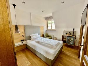 Postel nebo postele na pokoji v ubytování Schockes Laurentiushof