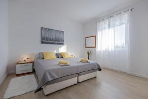 Ein Bett oder Betten in einem Zimmer der Unterkunft Guest House Anna