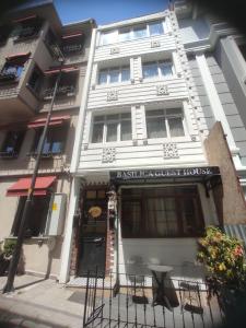 a white building with a restaurant in front of it at Basilica Guest House in Istanbul