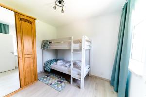 Postel nebo postele na pokoji v ubytování Velden Appartements am Wörthersee