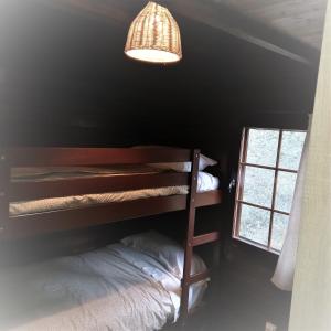 Posteľ alebo postele v izbe v ubytovaní Mas Olivella Cabaña Grande (Big Cabin)