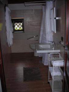 Vonios kambarys apgyvendinimo įstaigoje Il Giardino di Galatea