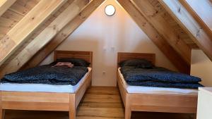 Postel nebo postele na pokoji v ubytování Apartmány Pod Jelenkou