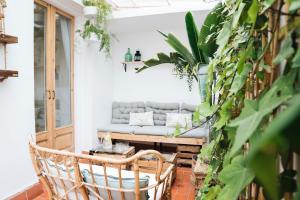 a living room with a couch and a table at HA Balmes Terrace Apartments in Barcelona