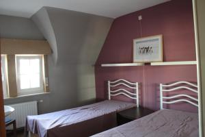 Postel nebo postele na pokoji v ubytování Villa Géry R-303