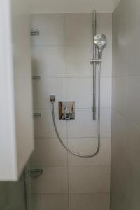 Phòng tắm tại Luxury Apartment Weisses Rössl Residenzen