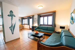 Posezení v ubytování Apartment Weitblick - Almresort Gerlitzen