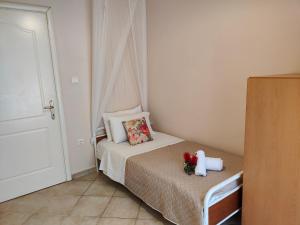Postel nebo postele na pokoji v ubytování ML Saroko Apartment