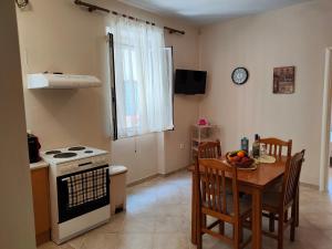 Kuchyň nebo kuchyňský kout v ubytování ML Saroko Apartment
