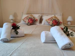 Postel nebo postele na pokoji v ubytování ML Saroko Apartment